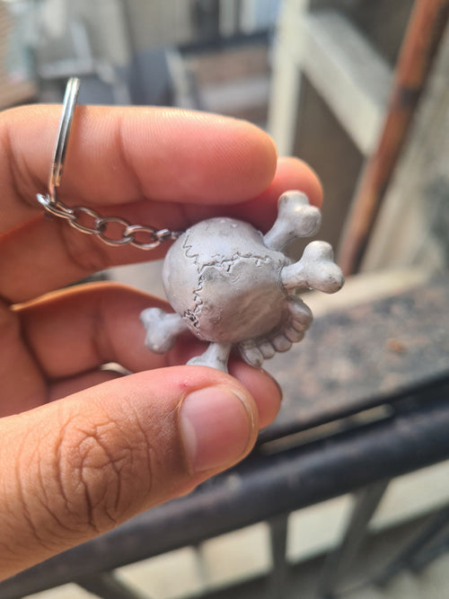 Jolly Rogue Skull Keychain ☠️ | Red-Eyed Crossbones | Premium Gothic Keychain
